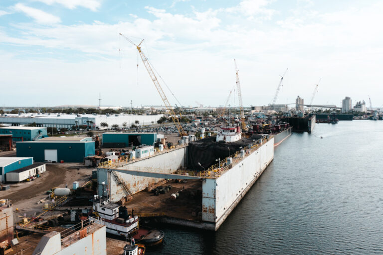 Recent view of a dry dock from the water side, highlighting Hendry Marine Industries' state-of-the-art ship repair facilities in Tampa, FL.